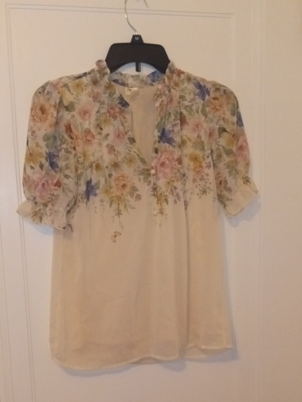 women xs sheer ivory top with flower print accent